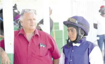  ??  ?? Apprentice Abigail Able with trainer Wayne Dacosta