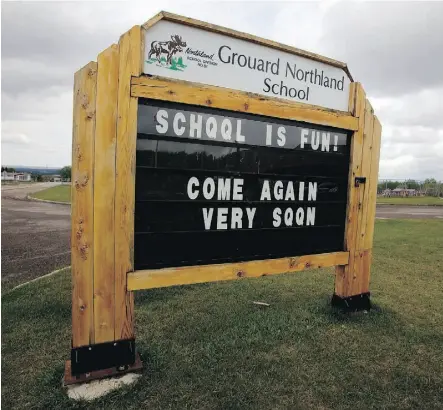 ?? GREG SOUTHAM/EDMONTON JOURNAL/FILE ?? Grouard Northland School welcomes students with a sign urging them not to skip classes, among initiative­s the school division has taken to reduce truancy.