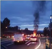  ?? Michael Miller / Courtesy photo ?? Bystanders helped pull a woman and an infant from a burning vehicle Wednsday afternoon.