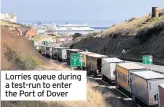  ??  ?? Lorries queue during a test-run to enter the Port of Dover