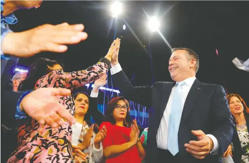  ?? DARREN MAKOWICHUK / POSTMEDIA NEWS ?? Alberta United Conservati­ve leader Jason Kenney celebrates his party’s win on election night in Calgary.
