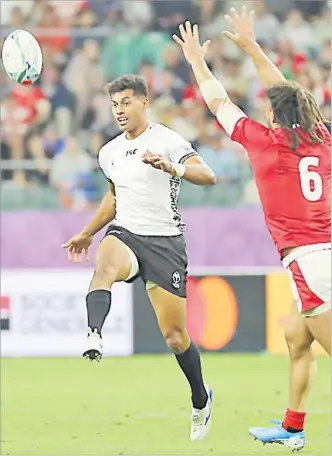  ?? Picture: JOVESA NAISUA ?? Flying Fijians fly half Ben Volavola in action against Wales during their pool match at the Oita Stadium in Oita, Japan.