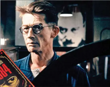  ?? ?? THE IRONY: John Hurt in the cinema version of Orwell’s prophetic novel Nineteen Eighty-Four, left, which now carries a content warning