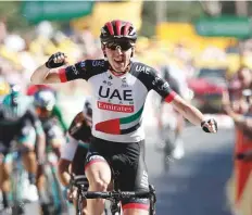  ?? AP ?? Ireland’s Daniel Martin celebrates as he crosses the finish line to win the sixth stage of the Tour de France cycling race.