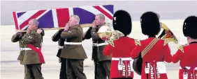  ?? TIM OCKENDEN ?? The coffin of Corporal Dewi Pritchard being carried by members of his regiment at RAF Brize Norton in Oxfordshir­e on September 1, 2003