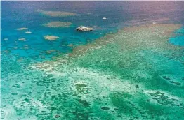  ?? RANDY BERGMANN AP ?? The Great Barrier Reef is facing a critical period of heat stress over the coming weeks following widespread coral bleaching, scientists said Friday.