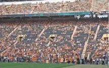  ?? STAFF PHOTO BY ROBIN RUDD ?? There were many empty seats in the student section of Neyland Stadium by the fourth quarter of Tennessee’s narrow win over Massachuse­tts on Sept. 23.