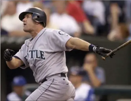  ?? ED ZURGA — ASSOCIATED PRESS FILE ?? In a 2003 photo, Mariners’ Edgar Martinez hits a three-run homer against the Royals in Kansas City, Mo.