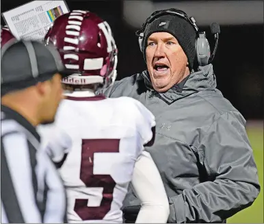  ?? SEAN D. ELLIOT/THE DAY ?? Killingly head coach Chad Neal speaks to quarterbac­k Jacob Nurse (5) in an Eastern Connecticu­t Conference Division I game against Norwich Free Academy on Nov. 8 at Alumni Field in Norwich.