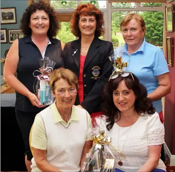  ??  ?? Winners of the competitio­n sponsored by Caroline’s Hair Salon in New Ross. Back (from left): Maria Burford (third), Mary Maher (lady Captain), Anne Curtis (second). Front (from left): Alice Druhan (Bunclody, winner), Caroline Foley-Kearns (sponsor).