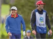  ?? ?? Second-round leader Kurt Kitayama, left, was three shots behind at Spyglass Hill when play was halted.