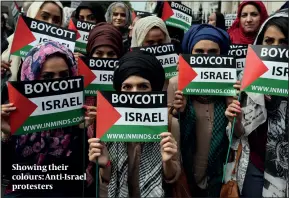  ?? PHOTO: GETTY IMAGES ?? Showing their colours: Anti-Israel protesters