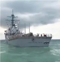  ??  ?? THE US NAVY guided-missile destroyer USS John S. McCain is seen after a collision, in Singapore waters in this still frame taken from video Aug. 21.