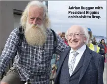  ??  ?? Adrian Duggan with President Higgins on his visit to Bray.