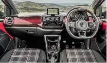  ??  ?? INTERIOR Familiar GTI tartan trim is a throwback to the original Golf, and an appealing retro touch
