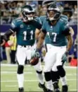  ?? THE ASSOCIATED PRESS FILE ?? The Eagles’ Alshon Jeffery, right in this celebratio­n shot with Carson Wentz against Dallas last season, said he didn’t know if he could be part of the starting lineup Sunday in Tennessee.