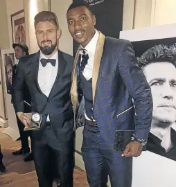  ?? / TWITTER ?? Oscarine Masuluke enjoys his moment with Arsenal’s Olivier Giroud at the Fifa awards gala in London.