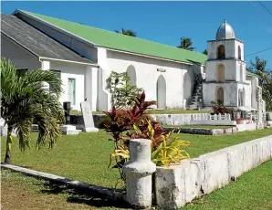  ??  ?? Whitewashe­d coral churches are central to Atiu life.