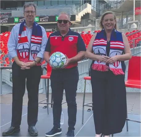  ?? TIM BAINES ?? Ottawa Mayor Jim Watson, left, Atletico Ottawa president and strategic partner Jeff Hunt and Lisa MacLeod, Ontario's minister of heritage, sport, tourism and culture industries, announced Atletico Ottawa will have a Pay What You Want ticket initiative for its home opener.