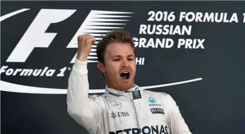  ?? — AFP ?? SOCHI: This file photo taken on May 01, 2016 shows Mercedes AMG Petronas F1 Team’s German driver Nico Rosberg celebratin­g on the podium after winning the Formula One Russian Grand Prix at the Sochi Autodrom circuit. Nico Rosberg announced yesterday...