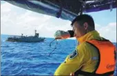  ?? PROVIDED TO CHINA DAILY ?? Chinese and Thai crews (clockwise from top) work on search and rescue on Sunday in the waters off Phuket, Thailand, near the site of Thursday’s deadly capsizing of two ships. Friends return survivor Huang Junxiong to his ward in Phuket on Sunday. ZHANG...