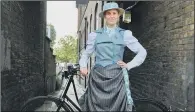  ??  ?? IN THE SADDLE: A model wearing a Victorian designed cycling skirt, known as the Hyde Park Safety Skirt, designed for female riders.