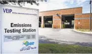  ?? KEVIN RICHARDSON/BALTIMORE SUN ?? The state plans to turn Vehicle Emissions Inspection centers into drive-thru testing centers.