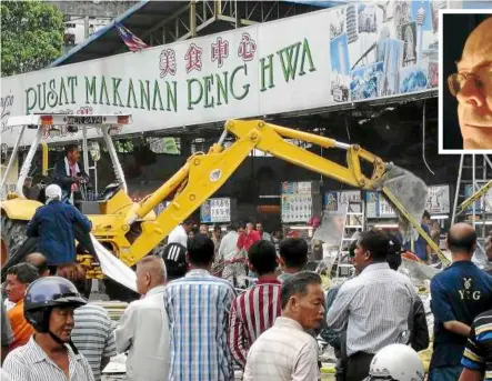  ??  ?? Pudu progresses: Writer James Mcanna’s image of the demolition of the Peng Hwa food court in Pudu; crowds turned up to witness the passing of a historical landmark. — Photos from James Mcanna