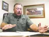  ??  ?? Rhea County Sheriff Mike Neal talks in his office Wednesday about the overcrowdi­ng problem.