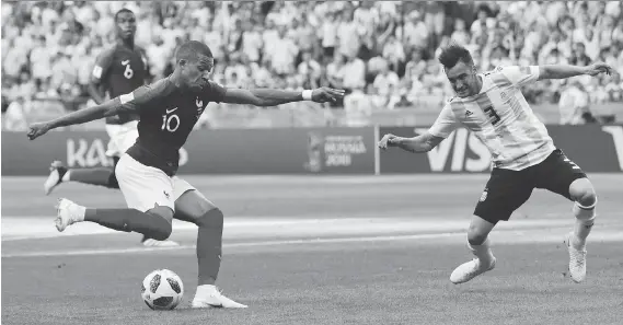  ?? RICARDO MAZALAN/THE ASSOCIATED PRESS ?? The play of French teenager Kylian Mbappe, left, at this year’s World Cup has many touting him as the next superstar in the sport.