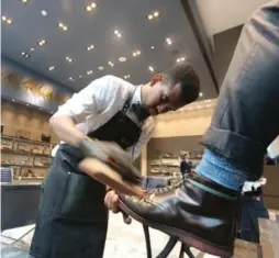  ?? VINCE TALOTTA/TORONTO STAR FILE PHOTO ?? Removing luxury services such as the shoe-shine service and barber chairs will allow Holt Renfrew to invest more in brand presentati­on.
