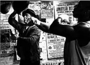  ?? WARNER BROS. ?? Michael B. Jordan, right, is young fighter Adonis Johnson, and Sylvester Stallone plays an aging Rocky Balboa who coaches Johnson in “Creed.”