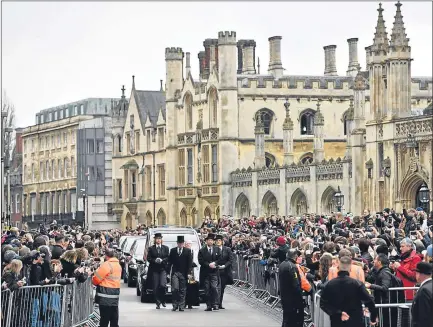  ??  ?? Crowds lined the streets as the cortege made its way to Cambridge’s University Church of St Mary the Great