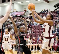  ?? Bud Sullins/Special to Siloam Sunday ?? Siloam Springs senior Jael Harried takes a shot on the baseline as Russellvil­le’s Cara Davis defends Tuesday at Panther Activity Center. Harried tied a career-high with 33 points as the Lady Panthers defeated the Lady Cyclones 67-62.