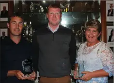  ??  ?? Winners Rory McCarthy and Joanne Kenny of Gary McLean profession­al’s prizes in Bunclody Golf and Fishing Club.