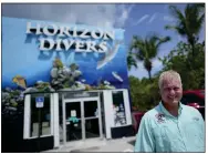  ?? AP PHOTO/REBECCA BLACKWELL ?? Dan Dawson, owner of Horizon Divers, poses outside his dive shop in Key Largo, Fla., Thursday, Aug. 17, 2023.