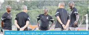  ?? ?? DOHA: Ghana’s coach Otto Addo (right) shares a joke with his assistants during a training session at Aspire training zone in Doha on November 27, 2022. —AFP