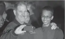  ?? JOSHUA ROBERTS/REUTERS FILE PHOTO ?? Texas school officials were under fire in September after Ahmed Mohamed, right, was arrested after taking a homemade clock to school.