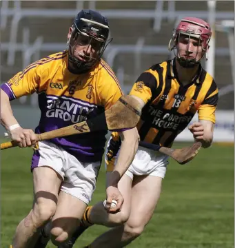  ??  ?? Veteran Faythe Harriers defender Emmet Keeling is closed down by Shelmalier­s newcomer Ross Banville in their Pettitt’s SHC meeting in Innovate Wexford Park on Saturday.