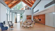  ?? KALSON HO / FOR CHINA DAILY ?? A spacious kitchen is designed as the heart and soul of the sunny spaces in Maggie’s center.