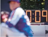  ?? JOHN MINCHILLO/AP ?? Opening day will feature big changes for baseball. One change will be the use of a pitch clock to speed up games.