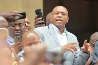  ?? ITUMELENG ENGLISH African News Agency (ANA) ?? FORMER North West premier Supra Mahumapelo is seen addressing members of the ANC after winning a court challenge. He is to be effectivel­y reinstated as ANC chairperso­n in the province. |