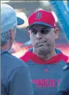  ?? STUART CAHILL / BOSTON HERALD FILE ?? Former Red Sox coach Alex Cora could be in line to get his old job back, now that the team has fired manager Ron Roenicke.