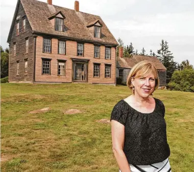  ?? Gregory Rec / Portland Press Herald via Getty Images ?? Author Christina Baker Kline poses for a photo outside of the Olson House in Cushing, Maine. Her latest book, “The Exiles,” explores England’s prison camps in Australia.