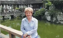  ?? PROVIDED TO CHINA DAILY ?? Katherine Whitman at Yu Garden in Shanghai during a trip to China. As an educator, she has made more than 100 trips to China over the past three decades.