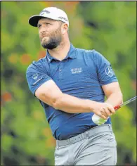  ?? The Associated Press Ryan Kang ?? Jon Rahm played bogey-free Saturday to take control heading to the final round of the Genesis Invitation­al. With a win Sunday, he can return to No. 1 in the rankings.