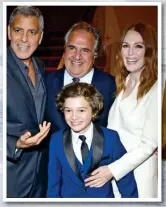  ??  ?? Rising star: With George Clooney, Paramount Pictures boss Jim Gianopulos and Julianne Moore at the Suburbicon premiere