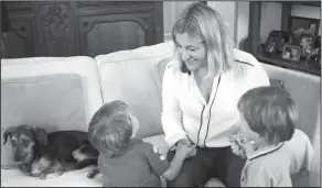  ?? Domenico Stinellis/AP ?? Risky: Federica Bianchi talks with her twin sons at their home in Rome. In October 2015, Bianchi brought Edoardo to Bambino Gesu's emergency room with breathing problems. He improved, but came down with another illness two days later that caused severe...