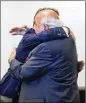  ?? CONTRIBUTE­D BY SIMON EDELMAN / DEPARTMENT OF ENERGY 2017 ?? Energy Secretary Rick Perry embraces Robert E. Murray, a coal industry executive, in Washington.