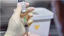  ?? EPA PIC ?? A nurse filling a syringe with the Pfizer-BioNTech Covid-19 vaccine at the National Medical Centre in Seoul, South Korea, on Saturday.